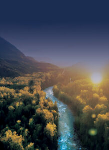 river with trees and mountains