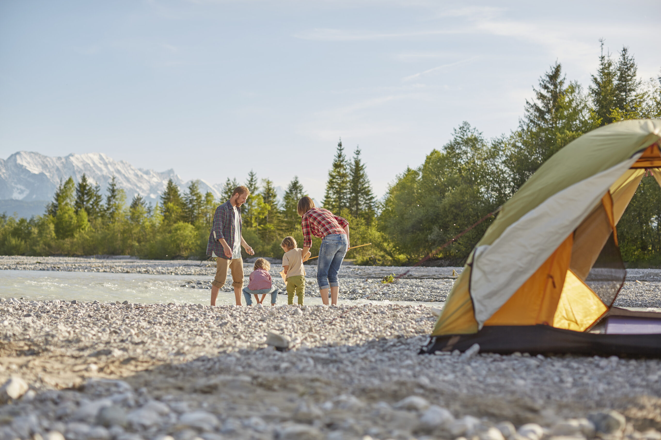 family of 3 at the river